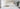 straight on photos of bed made up with Damask Bed linens. 4 regular pillows and 5 Boudoir cushions. Gold servering tray sitting on the foot of the bed with white and gold porcelain tea set